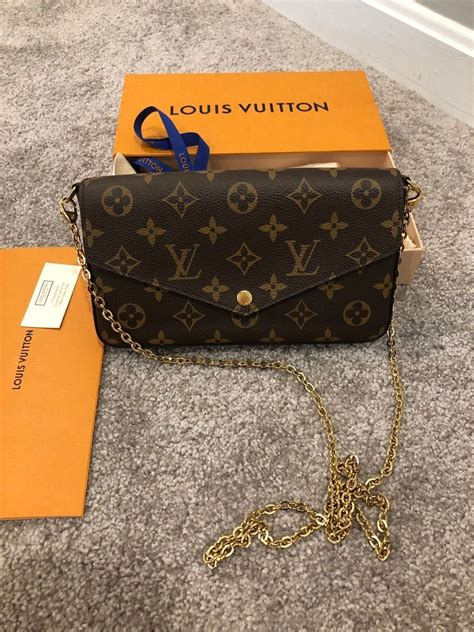 louis vuitton black purse with gold chain|louis vuitton black checkered bag.